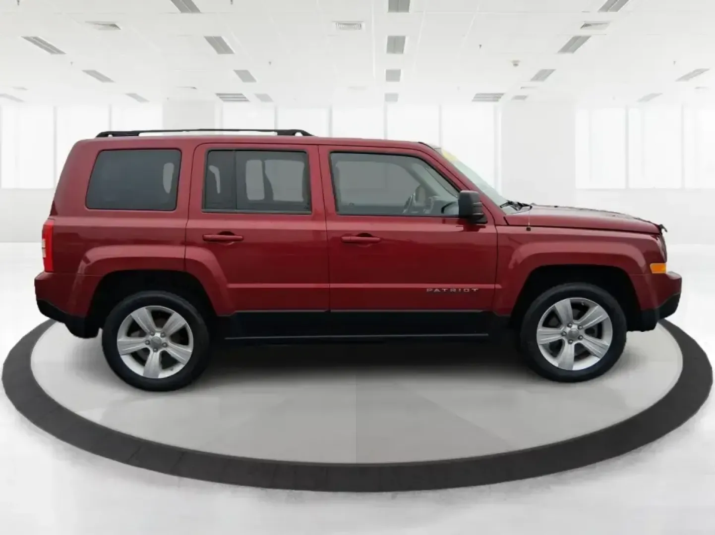 2012 Jeep Patriot Latitude (1C4NJPFB0CD) with an 2.4L L4 DOHC 16V engine, located at 1230 East Main St, Xenia, OH, 45385, (937) 908-9800, 39.688026, -83.910172 - Picture your next weekend: a quick run up I-75 for a family visit, a scenic drive past the Miami River, then an easy loop back through downtown Troy for dinner-without worrying about whether your SUV can keep up with daily life. This 2012 Jeep Patriot Latitude is built for practical adventures and e - Photo#1