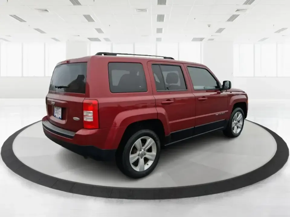 2012 Jeep Patriot Latitude (1C4NJPFB0CD) with an 2.4L L4 DOHC 16V engine, located at 1230 East Main St, Xenia, OH, 45385, (937) 908-9800, 39.688026, -83.910172 - Picture your next weekend: a quick run up I-75 for a family visit, a scenic drive past the Miami River, then an easy loop back through downtown Troy for dinner-without worrying about whether your SUV can keep up with daily life. This 2012 Jeep Patriot Latitude is built for practical adventures and e - Photo#2