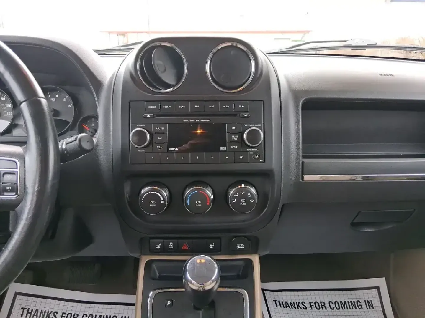 2012 Jeep Patriot Latitude (1C4NJPFB0CD) with an 2.4L L4 DOHC 16V engine, located at 1230 East Main St, Xenia, OH, 45385, (937) 908-9800, 39.688026, -83.910172 - Picture your next weekend: a quick run up I-75 for a family visit, a scenic drive past the Miami River, then an easy loop back through downtown Troy for dinner-without worrying about whether your SUV can keep up with daily life. This 2012 Jeep Patriot Latitude is built for practical adventures and e - Photo#13