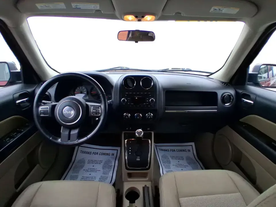 2012 Jeep Patriot Latitude (1C4NJPFB0CD) with an 2.4L L4 DOHC 16V engine, located at 1230 East Main St, Xenia, OH, 45385, (937) 908-9800, 39.688026, -83.910172 - Picture your next weekend: a quick run up I-75 for a family visit, a scenic drive past the Miami River, then an easy loop back through downtown Troy for dinner-without worrying about whether your SUV can keep up with daily life. This 2012 Jeep Patriot Latitude is built for practical adventures and e - Photo#19