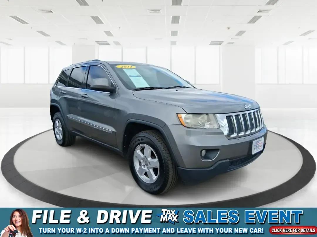 2013 Jeep Grand Cherokee Laredo (1C4RJFAG1DC) with an 3.6L V6 DOHC 24V engine, 5-Speed Automatic transmission, located at 401 Woodman Dr, Riverside, OH, 45431, (937) 908-9800, 39.760899, -84.123421 - Pack up the family, point the hood toward the next weekend getaway, and enjoy the confidence that comes with a capable SUV built for real life in Ohio. This 2013 Jeep Grand Cherokee Laredo in Mineral Gray Metallic Clearcoat is the kind of vehicle that fits your routine Monday through Friday-then tur - Photo#0