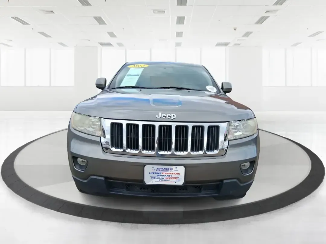 2013 Jeep Grand Cherokee Laredo (1C4RJFAG1DC) with an 3.6L V6 DOHC 24V engine, 5-Speed Automatic transmission, located at 401 Woodman Dr, Riverside, OH, 45431, (937) 908-9800, 39.760899, -84.123421 - Pack up the family, point the hood toward the next weekend getaway, and enjoy the confidence that comes with a capable SUV built for real life in Ohio. This 2013 Jeep Grand Cherokee Laredo in Mineral Gray Metallic Clearcoat is the kind of vehicle that fits your routine Monday through Friday-then tur - Photo#7