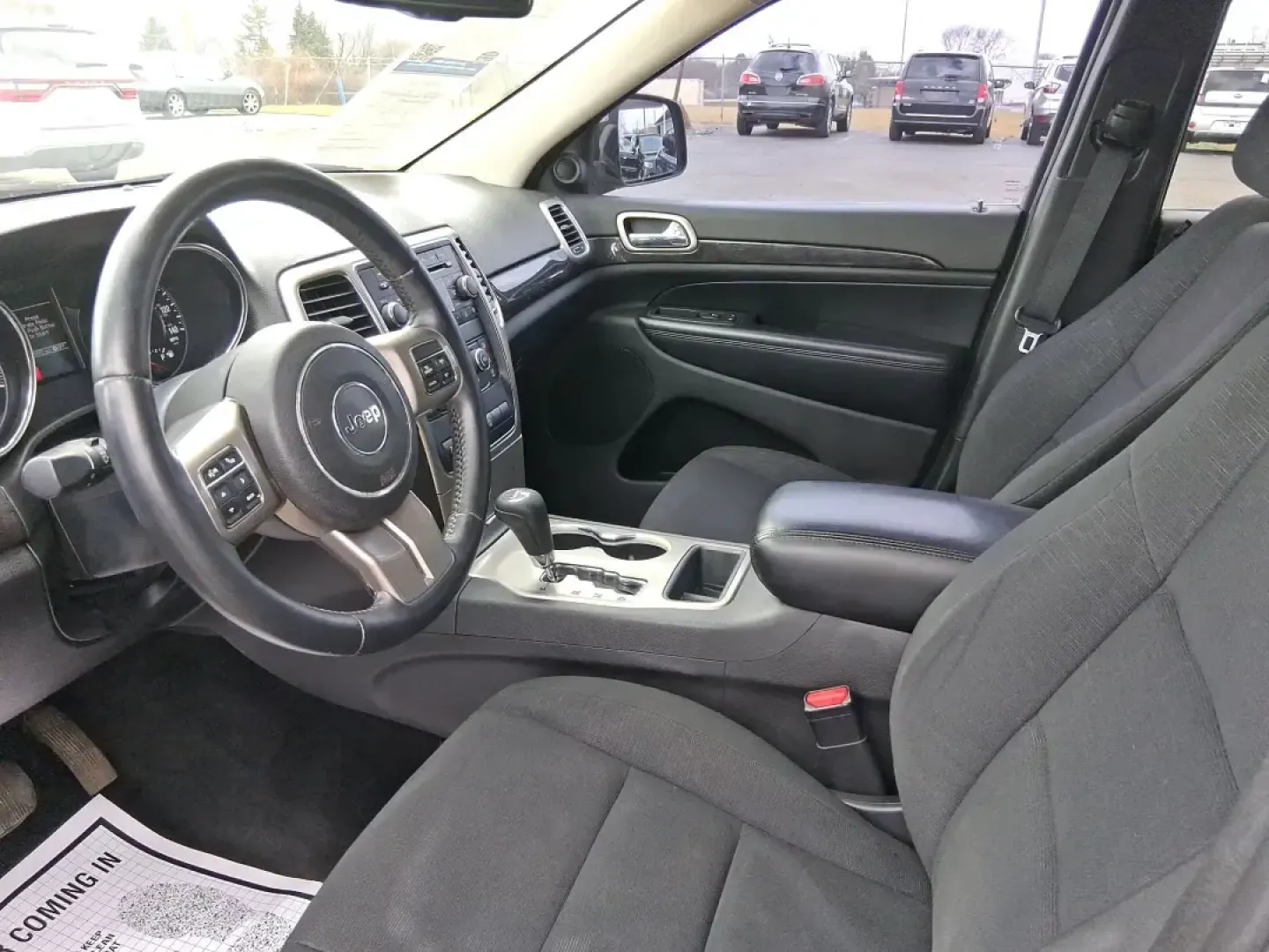 2013 Jeep Grand Cherokee Laredo (1C4RJFAG1DC) with an 3.6L V6 DOHC 24V engine, 5-Speed Automatic transmission, located at 401 Woodman Dr, Riverside, OH, 45431, (937) 908-9800, 39.760899, -84.123421 - Pack up the family, point the hood toward the next weekend getaway, and enjoy the confidence that comes with a capable SUV built for real life in Ohio. This 2013 Jeep Grand Cherokee Laredo in Mineral Gray Metallic Clearcoat is the kind of vehicle that fits your routine Monday through Friday-then tur - Photo#9