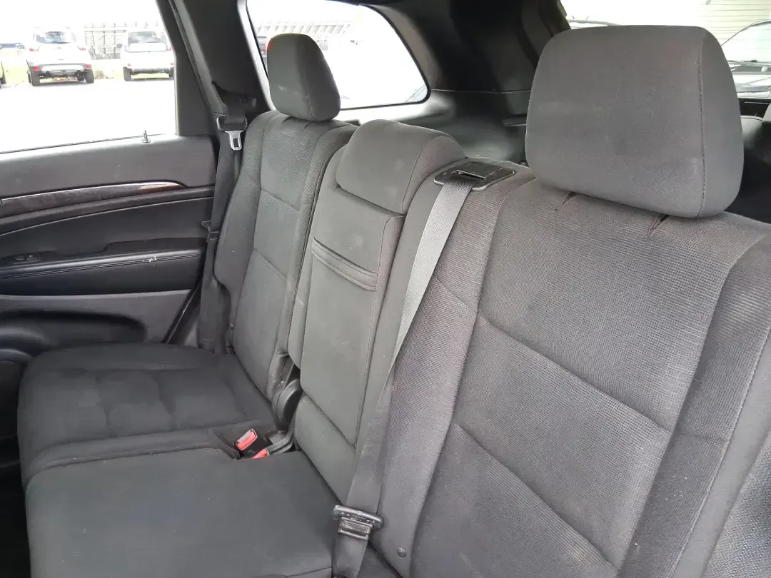 2013 Jeep Grand Cherokee Laredo (1C4RJFAG1DC) with an 3.6L V6 DOHC 24V engine, 5-Speed Automatic transmission, located at 401 Woodman Dr, Riverside, OH, 45431, (937) 908-9800, 39.760899, -84.123421 - Pack up the family, point the hood toward the next weekend getaway, and enjoy the confidence that comes with a capable SUV built for real life in Ohio. This 2013 Jeep Grand Cherokee Laredo in Mineral Gray Metallic Clearcoat is the kind of vehicle that fits your routine Monday through Friday-then tur - Photo#10