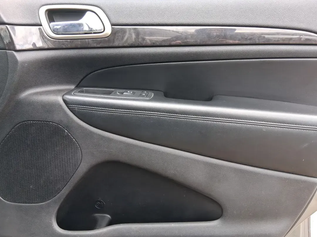 2013 Jeep Grand Cherokee Laredo (1C4RJFAG1DC) with an 3.6L V6 DOHC 24V engine, 5-Speed Automatic transmission, located at 401 Woodman Dr, Riverside, OH, 45431, (937) 908-9800, 39.760899, -84.123421 - Pack up the family, point the hood toward the next weekend getaway, and enjoy the confidence that comes with a capable SUV built for real life in Ohio. This 2013 Jeep Grand Cherokee Laredo in Mineral Gray Metallic Clearcoat is the kind of vehicle that fits your routine Monday through Friday-then tur - Photo#20