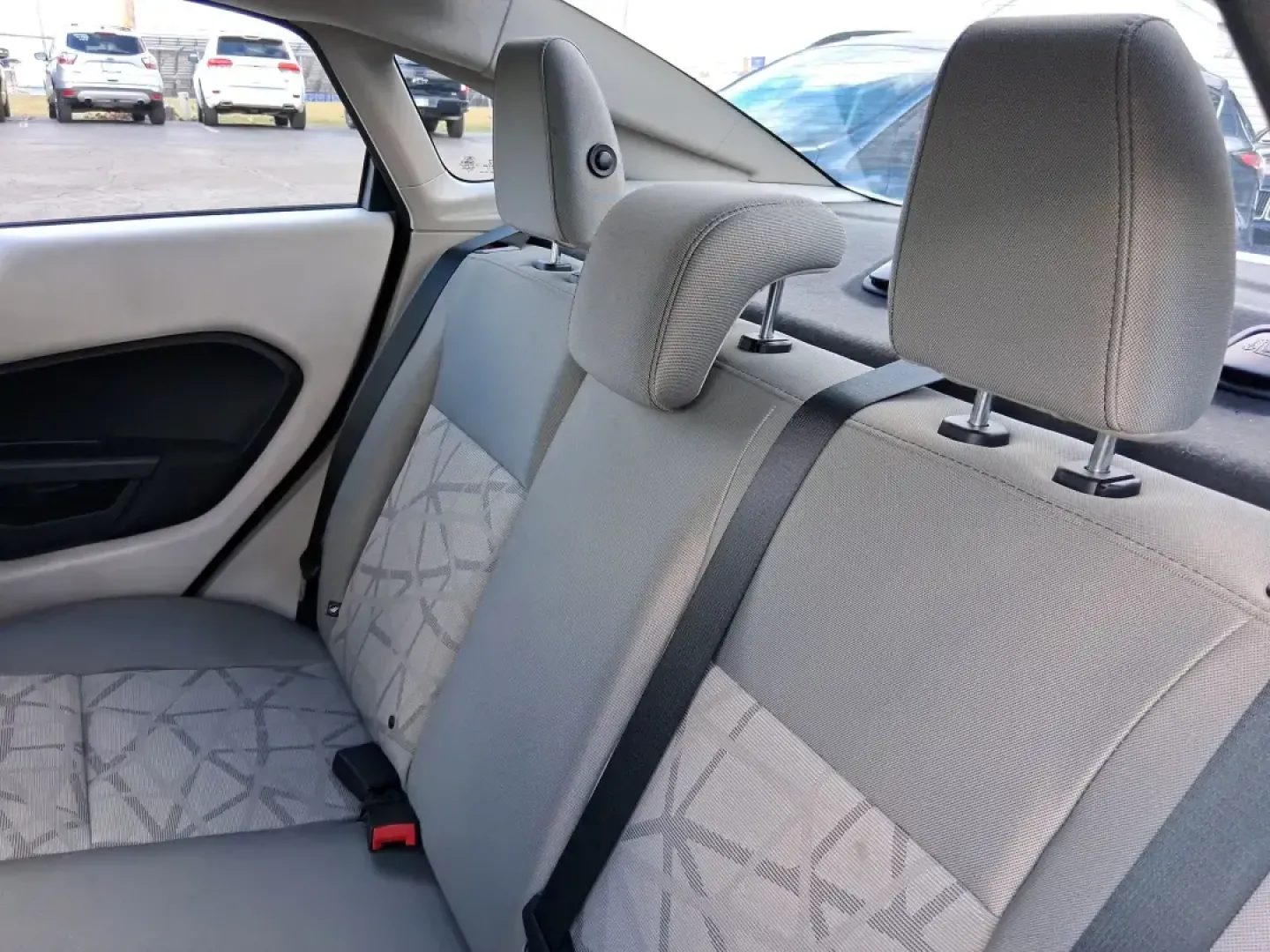 2013 Ford Fiesta SE (3FADP4BJXDM) with an 1.6L I-4 DOHC engine, located at 1951 S Dayton Lakeview Rd., New Carlisle, OH, 45344, (937) 908-9800, 39.890999, -84.050255 - Need a smart, efficient commuter that's easy to park downtown, nimble on I70, and still comfortable for weekend errands or a quick getaway to Springfield or Dayton? This 2013 Ford Fiesta SE Sedan in Oxford White delivers practical daily driving with the kind of budget-friendly ownership that fits re - Photo#10