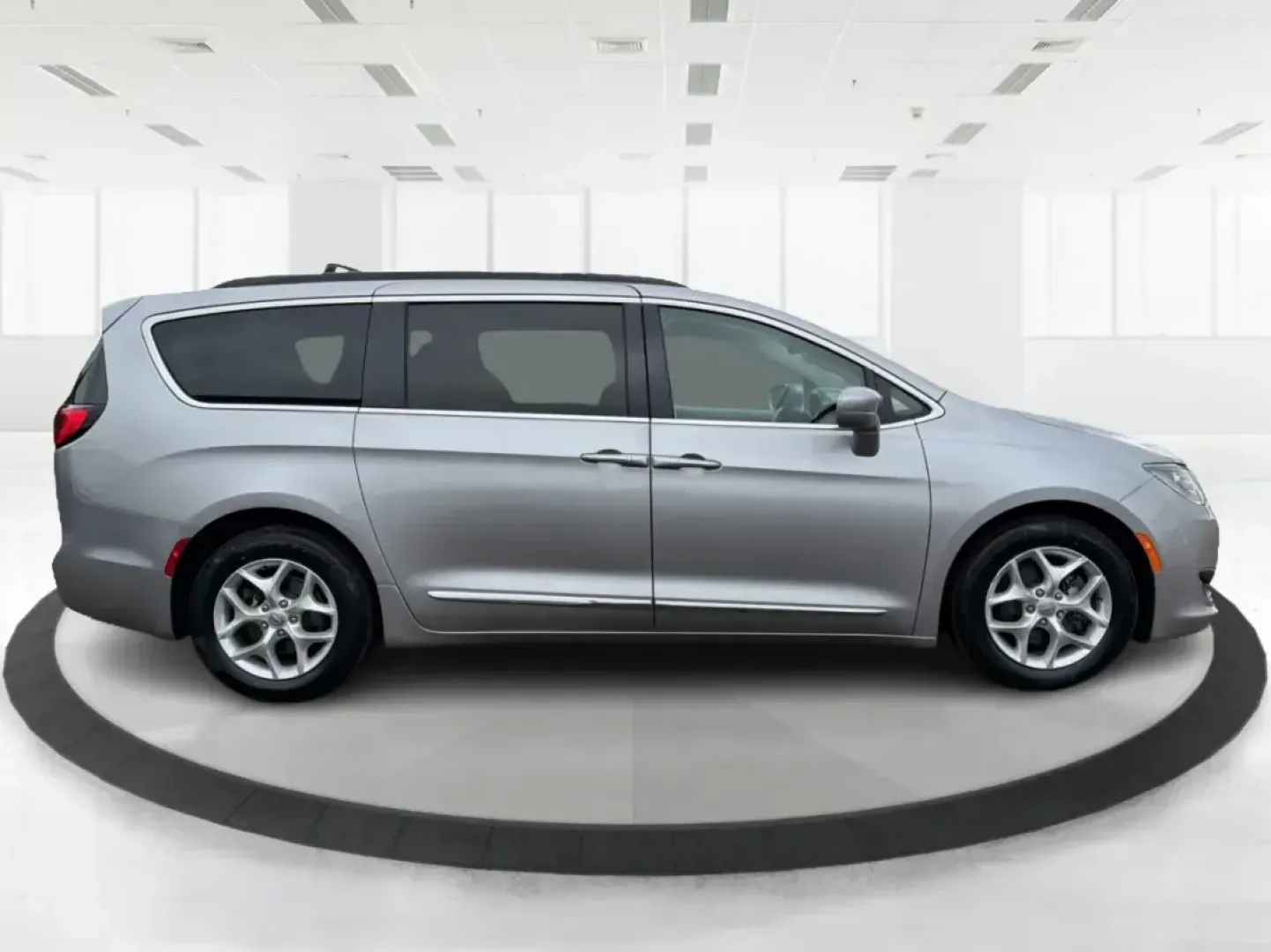 2017 Chrysler Pacifica Touring-L (2C4RC1BG1HR) with an Pentastar 3.6L V-6 DOHC engine, 6A transmission, located at 401 Woodman Dr, Riverside, OH, 45431, (937) 908-9800, 39.760899, -84.123421 - Life gets busy fast-school drop-offs, long commutes, weekend tournaments, and road trips that somehow require half the house. If you need one vehicle that can handle the everyday grind and still feel comfortable when you're headed out for a family getaway, this **2017 Chrysler Pacifica Touring-L** i - Photo#1