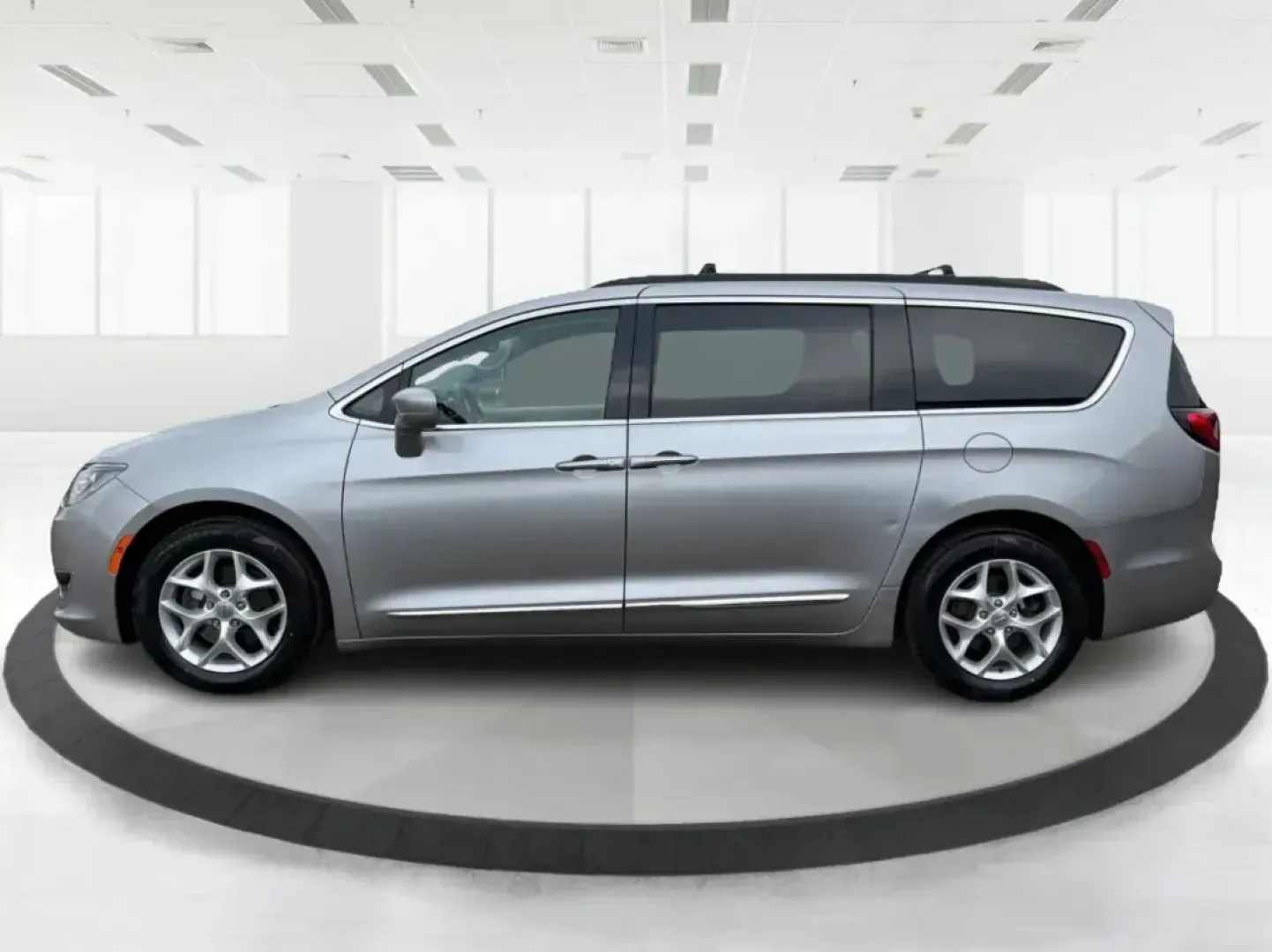 2017 Chrysler Pacifica Touring-L (2C4RC1BG1HR) with an Pentastar 3.6L V-6 DOHC engine, 6A transmission, located at 401 Woodman Dr, Riverside, OH, 45431, (937) 908-9800, 39.760899, -84.123421 - Life gets busy fast-school drop-offs, long commutes, weekend tournaments, and road trips that somehow require half the house. If you need one vehicle that can handle the everyday grind and still feel comfortable when you're headed out for a family getaway, this **2017 Chrysler Pacifica Touring-L** i - Photo#5