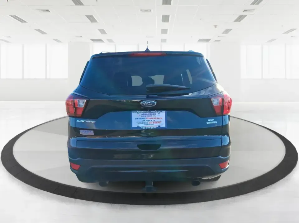 2019 Ford Escape SE (1FMCU0GD6KU) with an 1.5L L4 DOHC 16V engine, 6A transmission, located at 401 Woodman Dr, Riverside, OH, 45431, (937) 908-9800, 39.760899, -84.123421 - Need a dependable SUV for long commutes down I-675, quick school drop-offs, and weekend getaways to Carillon Historical Park or a day at the National Museum of the U.S. Air Force? This 2019 Ford Escape SE in Agate Black Metallic is built for real-life driving in and around Riverside, Ohio-comfortabl - Photo#3