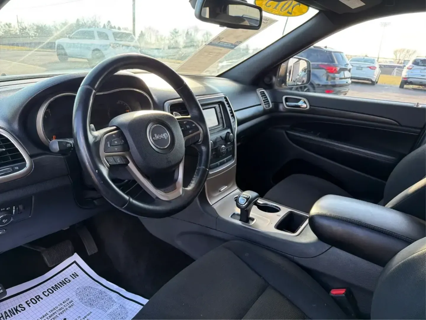 2015 Jeep Grand Cherokee Laredo (1C4RJFAG7FC) with an 3.6L V-6 DOHC engine, 8-Speed Automatic transmission, located at 401 Woodman Dr, Riverside, OH, 45431, (937) 908-9800, 39.760899, -84.123421 - Picture your next weekend: you're loading up the family for a quick getaway to Caesars Creek, grabbing groceries after work, or cruising I-675 toward Dayton with a confident, comfortable SUV that feels ready for anything Ohio weather throws your way. This 2015 Jeep Grand Cherokee Laredo 4WD is built - Photo#9