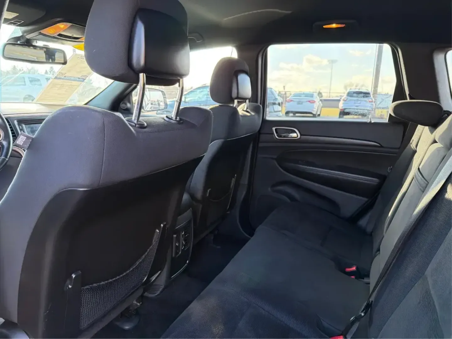 2015 Jeep Grand Cherokee Laredo (1C4RJFAG7FC) with an 3.6L V-6 DOHC engine, 8-Speed Automatic transmission, located at 401 Woodman Dr, Riverside, OH, 45431, (937) 908-9800, 39.760899, -84.123421 - Picture your next weekend: you're loading up the family for a quick getaway to Caesars Creek, grabbing groceries after work, or cruising I-675 toward Dayton with a confident, comfortable SUV that feels ready for anything Ohio weather throws your way. This 2015 Jeep Grand Cherokee Laredo 4WD is built - Photo#10