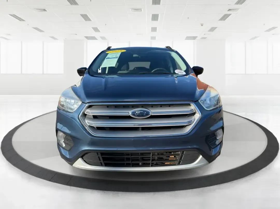 2018 Ford Escape SE (1FMCU9GD4JU) with an 1.5L L4 DOHC 16V engine, 6A transmission, located at 1230 East Main St, Xenia, OH, 45385, (937) 908-9800, 39.688026, -83.910172 - Picture your next Ohio weekend: loading up the kids for a splash at Splash Xenia, cruising out to John Bryan State Park for a hike, or tackling a snowy morning commute from Beavercreek to downtown Dayton with confidence. This 2018 Ford Escape SE in Blue Metallic is the kind of compact SUV that fits - Photo#7