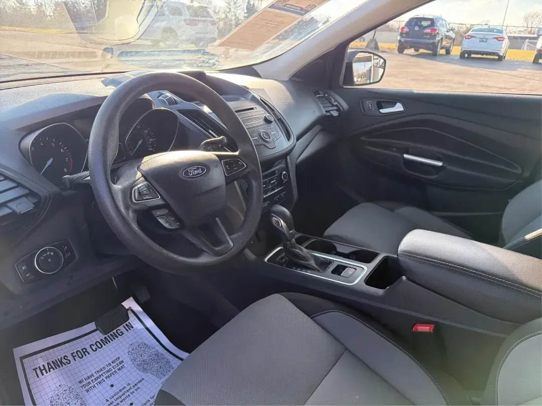 2018 Ford Escape SE (1FMCU9GD4JU) with an 1.5L L4 DOHC 16V engine, 6A transmission, located at 1230 East Main St, Xenia, OH, 45385, (937) 908-9800, 39.688026, -83.910172 - Picture your next Ohio weekend: loading up the kids for a splash at Splash Xenia, cruising out to John Bryan State Park for a hike, or tackling a snowy morning commute from Beavercreek to downtown Dayton with confidence. This 2018 Ford Escape SE in Blue Metallic is the kind of compact SUV that fits - Photo#9