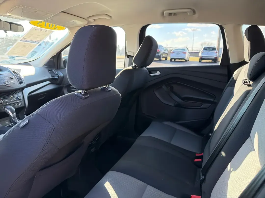 2018 Ford Escape SE (1FMCU9GD4JU) with an 1.5L L4 DOHC 16V engine, 6A transmission, located at 1230 East Main St, Xenia, OH, 45385, (937) 908-9800, 39.688026, -83.910172 - Picture your next Ohio weekend: loading up the kids for a splash at Splash Xenia, cruising out to John Bryan State Park for a hike, or tackling a snowy morning commute from Beavercreek to downtown Dayton with confidence. This 2018 Ford Escape SE in Blue Metallic is the kind of compact SUV that fits - Photo#10