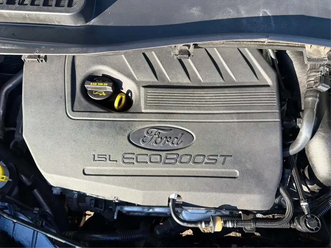 2018 Ford Escape SE (1FMCU9GD4JU) with an 1.5L L4 DOHC 16V engine, 6A transmission, located at 1230 East Main St, Xenia, OH, 45385, (937) 908-9800, 39.688026, -83.910172 - Picture your next Ohio weekend: loading up the kids for a splash at Splash Xenia, cruising out to John Bryan State Park for a hike, or tackling a snowy morning commute from Beavercreek to downtown Dayton with confidence. This 2018 Ford Escape SE in Blue Metallic is the kind of compact SUV that fits - Photo#11