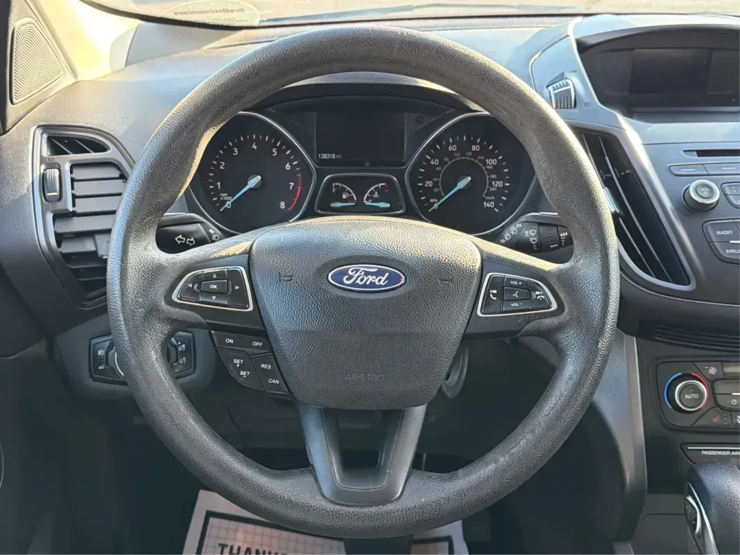 2018 Ford Escape SE (1FMCU9GD4JU) with an 1.5L L4 DOHC 16V engine, 6A transmission, located at 1230 East Main St, Xenia, OH, 45385, (937) 908-9800, 39.688026, -83.910172 - Picture your next Ohio weekend: loading up the kids for a splash at Splash Xenia, cruising out to John Bryan State Park for a hike, or tackling a snowy morning commute from Beavercreek to downtown Dayton with confidence. This 2018 Ford Escape SE in Blue Metallic is the kind of compact SUV that fits - Photo#16