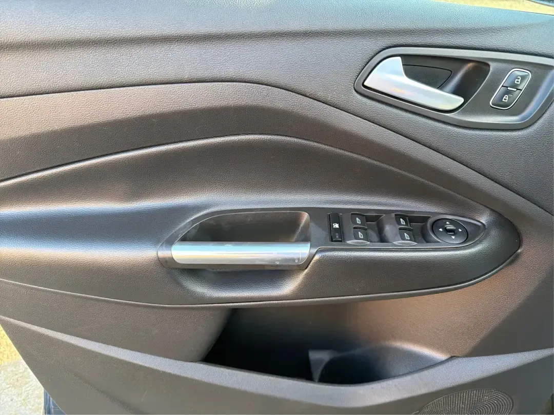 2018 Ford Escape SE (1FMCU9GD4JU) with an 1.5L L4 DOHC 16V engine, 6A transmission, located at 1230 East Main St, Xenia, OH, 45385, (937) 908-9800, 39.688026, -83.910172 - Picture your next Ohio weekend: loading up the kids for a splash at Splash Xenia, cruising out to John Bryan State Park for a hike, or tackling a snowy morning commute from Beavercreek to downtown Dayton with confidence. This 2018 Ford Escape SE in Blue Metallic is the kind of compact SUV that fits - Photo#19