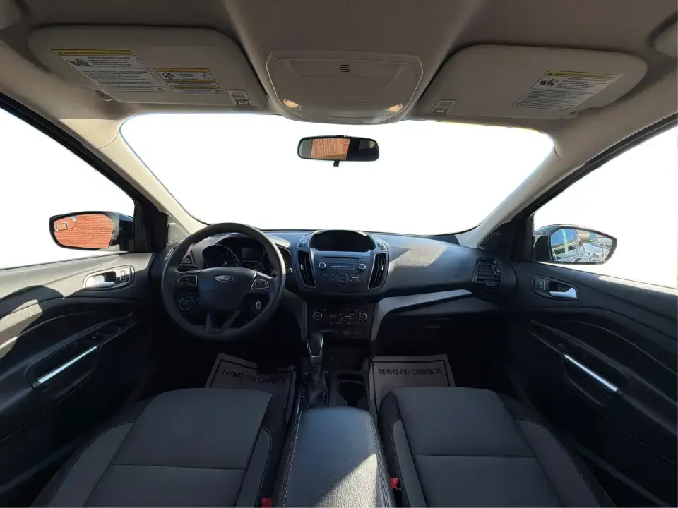 2018 Ford Escape SE (1FMCU9GD4JU) with an 1.5L L4 DOHC 16V engine, 6A transmission, located at 880 E. National Road, Vandalia, OH, 45377, (937) 908-9800, 39.891918, -84.183594 - Picture your next Ohio weekend: loading up the kids for a splash at Splash Xenia, cruising out to John Bryan State Park for a hike, or tackling a snowy morning commute from Beavercreek to downtown Dayton with confidence. This 2018 Ford Escape SE in Blue Metallic is the kind of compact SUV that fits - Photo#22