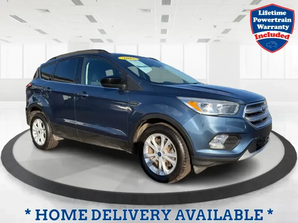 2018 Ford Escape SE 4WD (1FMCU9GD4JU) with an 1.5L L4 DOHC 16V engine, 6A transmission, located at 1951 S Dayton Lakeview Rd., New Carlisle, OH, 45344, (937) 908-9800, 39.890999, -84.050255 - Picture your next Ohio week looking easier: a confident commuter for I-70 runs, a comfortable family hauler for school drop-offs, and a ready-for-any-weather SUV for weekend trips out toward Springfield, Dayton, or a quick getaway to Buck Creek State Park. This 2018 Ford Escape SE 4WD fits that real- Photo#0