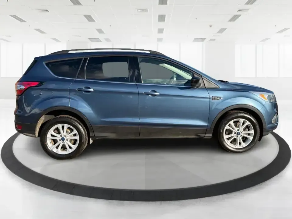 2018 Ford Escape SE 4WD (1FMCU9GD4JU) with an 1.5L L4 DOHC 16V engine, 6A transmission, located at 1951 S Dayton Lakeview Rd., New Carlisle, OH, 45344, (937) 908-9800, 39.890999, -84.050255 - Picture your next Ohio week looking easier: a confident commuter for I-70 runs, a comfortable family hauler for school drop-offs, and a ready-for-any-weather SUV for weekend trips out toward Springfield, Dayton, or a quick getaway to Buck Creek State Park. This 2018 Ford Escape SE 4WD fits that real- Photo#1