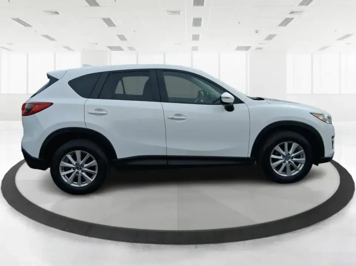 2016 Mazda CX-5 Touring (JM3KE4CY4G0) with an SKYACTIV-G 2.5L I-4 gasoline direct injection engine, 6-Speed Automatic transmission, located at 401 Woodman Dr, Riverside, OH, 45431, (937) 908-9800, 39.760899, -84.123421 - Weekend getaways to John Bryan State Park, everyday commuting down Woodman Dr, or hauling groceries back from The Greene-this 2016 Mazda CX-5 Touring is the kind of SUV that fits real life in Riverside, Ohio. With confident all-weather capability and a smart, comfortable cabin, it's a practical choi - Photo#1