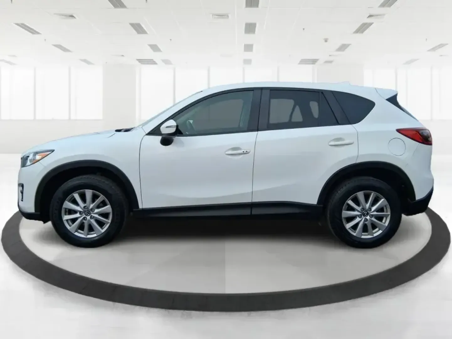 2016 Mazda CX-5 Touring (JM3KE4CY4G0) with an SKYACTIV-G 2.5L I-4 gasoline direct injection engine, 6-Speed Automatic transmission, located at 401 Woodman Dr, Riverside, OH, 45431, (937) 908-9800, 39.760899, -84.123421 - Weekend getaways to John Bryan State Park, everyday commuting down Woodman Dr, or hauling groceries back from The Greene-this 2016 Mazda CX-5 Touring is the kind of SUV that fits real life in Riverside, Ohio. With confident all-weather capability and a smart, comfortable cabin, it's a practical choi - Photo#5