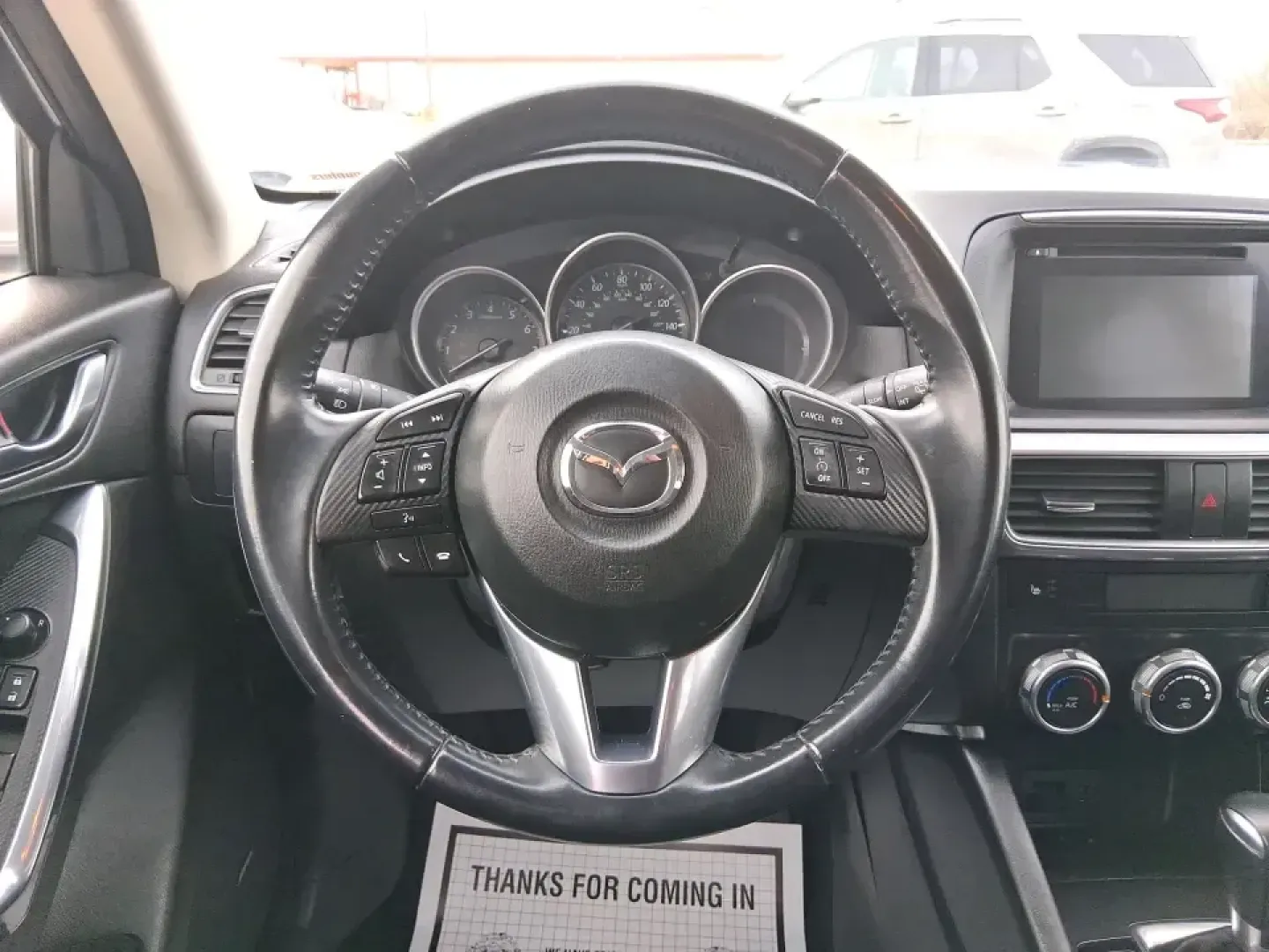 2016 Mazda CX-5 Touring (JM3KE4CY4G0) with an SKYACTIV-G 2.5L I-4 gasoline direct injection engine, 6-Speed Automatic transmission, located at 401 Woodman Dr, Riverside, OH, 45431, (937) 908-9800, 39.760899, -84.123421 - Weekend getaways to John Bryan State Park, everyday commuting down Woodman Dr, or hauling groceries back from The Greene-this 2016 Mazda CX-5 Touring is the kind of SUV that fits real life in Riverside, Ohio. With confident all-weather capability and a smart, comfortable cabin, it's a practical choi - Photo#16
