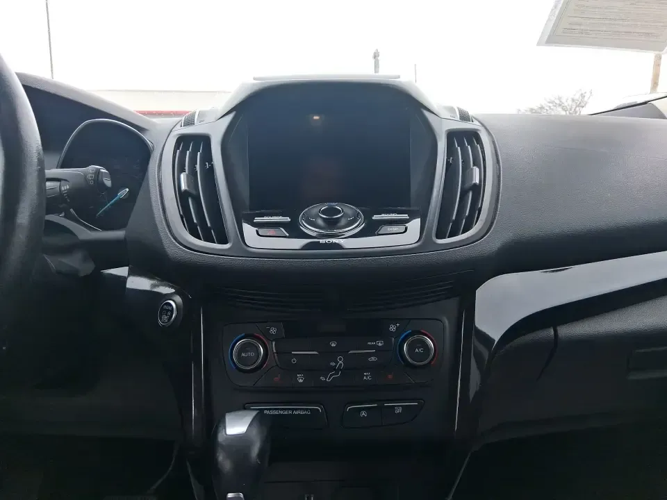 2017 Ford Escape Titanium (1FMCU9J9XHU) with an 2.0L L4 DOHC 16V engine, 6A transmission, located at 401 Woodman Dr, Riverside, OH, 45431, (937) 908-9800, 39.760899, -84.123421 - Picture your next Ohio weekend: a comfortable SUV loaded with gear, cruising down I-75 for a quick Dayton outing, then turning toward the MetroParks for a hike-without worrying about winter weather, tight parking lots, or long-drive fatigue. This 2017 Ford Escape Titanium is built for real life in M - Photo#13