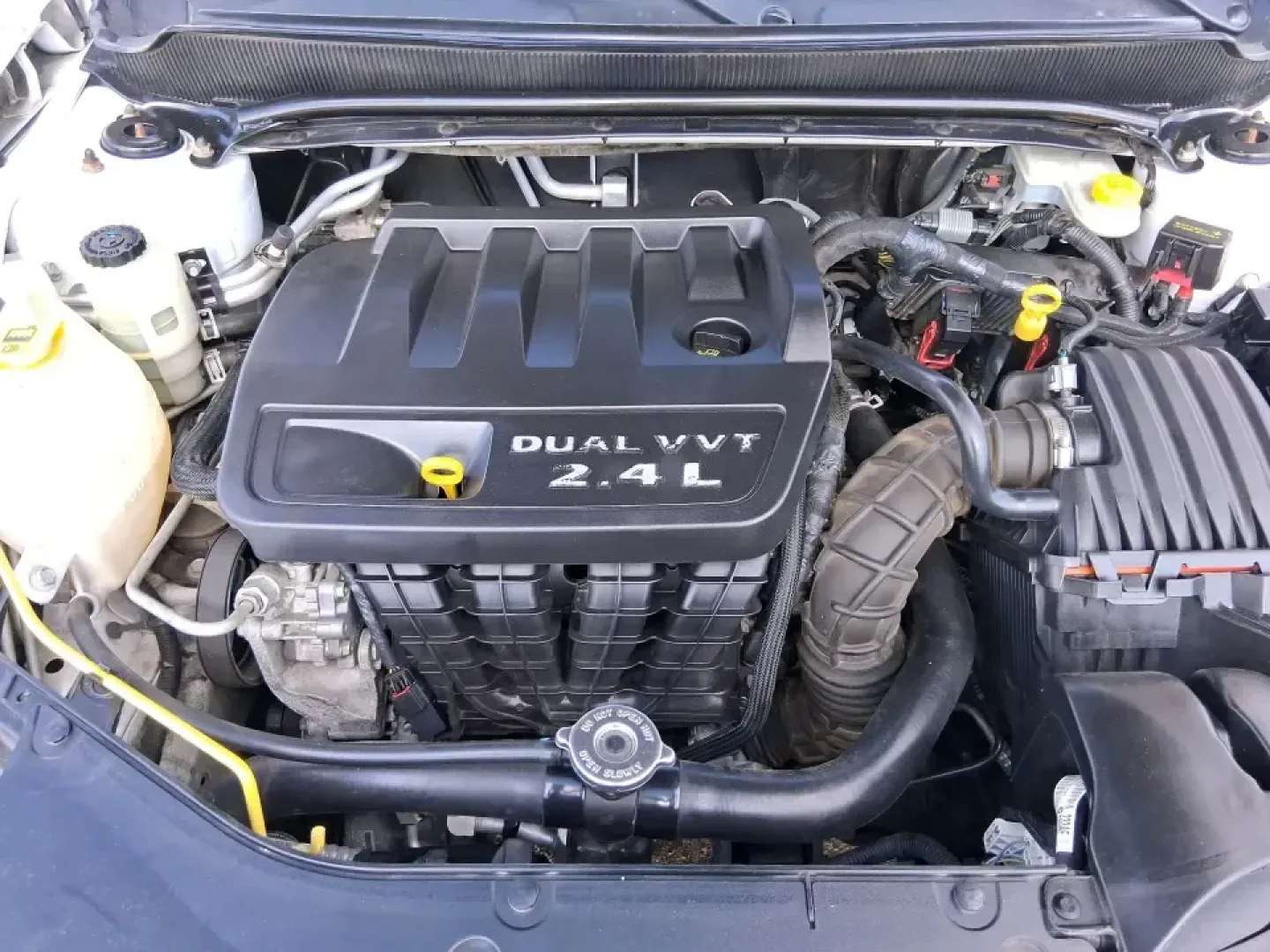 2014 Dodge Avenger SE (1C3CDZAB7EN) with an 2.4L L4 DOHC 16V engine, 4-Speed Automatic transmission, located at 4508 South Dixie Dr, Moraine, OH, 45439, (937) 908-9800, 39.689976, -84.218452 - Need a dependable sedan for the daily commute down I-75, quick school drop-offs, or weekend errands around Dayton-without the stress of traditional bank financing? This 2014 Dodge Avenger SE is a practical, comfortable choice for budget-conscious buyers who want a straightforward ride with the right - Photo#11