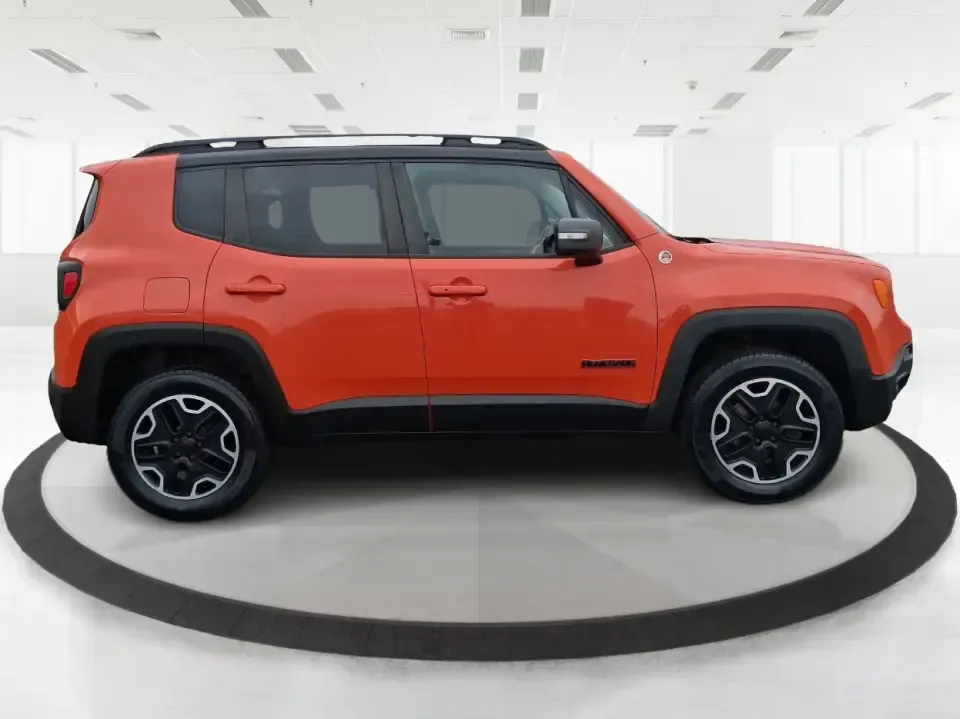 2016 Jeep Renegade Trailhawk (ZACCJBCT5GP) with an Tigershark MultiAir 2.4L I-4 variable valve contro engine, 9A transmission, located at 4508 South Dixie Dr, Moraine, OH, 45439, (937) 908-9800, 39.689976, -84.218452 - Weekend escapes, snowy commutes, and everyday errands feel easier when your crossover is ready for whatever Ohio throws your way. This **2016 Jeep Renegade Trailhawk** in eye-catching **Omaha Orange** is built for drivers who want real capability in a city-friendly size-perfect for exploring MetroPa - Photo#1