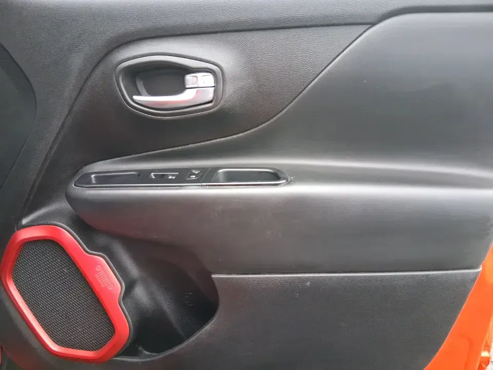 2016 Jeep Renegade Trailhawk (ZACCJBCT5GP) with an Tigershark MultiAir 2.4L I-4 variable valve contro engine, 9A transmission, located at 4508 South Dixie Dr, Moraine, OH, 45439, (937) 908-9800, 39.689976, -84.218452 - Weekend escapes, snowy commutes, and everyday errands feel easier when your crossover is ready for whatever Ohio throws your way. This **2016 Jeep Renegade Trailhawk** in eye-catching **Omaha Orange** is built for drivers who want real capability in a city-friendly size-perfect for exploring MetroPa - Photo#20