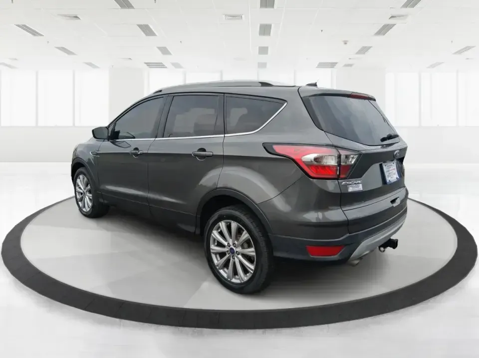 2017 Ford Escape Titanium (1FMCU9J94HU) with an 2.0L L4 DOHC 16V engine, 6A transmission, located at 1951 S Dayton Lakeview Rd., New Carlisle, OH, 45344, (937) 908-9800, 39.890999, -84.050255 - Pack the gear, load up the family, and point the GPS toward your next weekend escape-this 2017 Ford Escape Titanium is the kind of compact SUV that fits real life in Piqua. Whether you're commuting up I75, running errands along N County Rd 25A, or planning a day trip to Lock 9 Park and the Great Mia - Photo#4