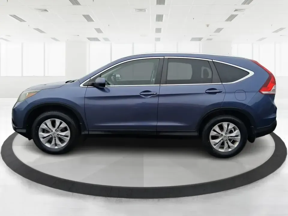 2013 Honda CR-V EX-L (2HKRM4H74DH) with an 2.4L I-4 DOHC engine, 5-Speed Automatic transmission, located at 1099 N County Rd 25A , Troy, OH, 45373, (937) 908-9800, 40.057079, -84.212883 - Picture your next weekend: a quick run up I75 for a Dayton Dragons game, a family trip to Treasure Island Park, or a snowy school-morning commute across Troy-without stressing about space, comfort, or traction. This 2013 Honda CRV EXL in Twilight Blue Metallic is the kind of do-it-all SUV that fits - Photo#5