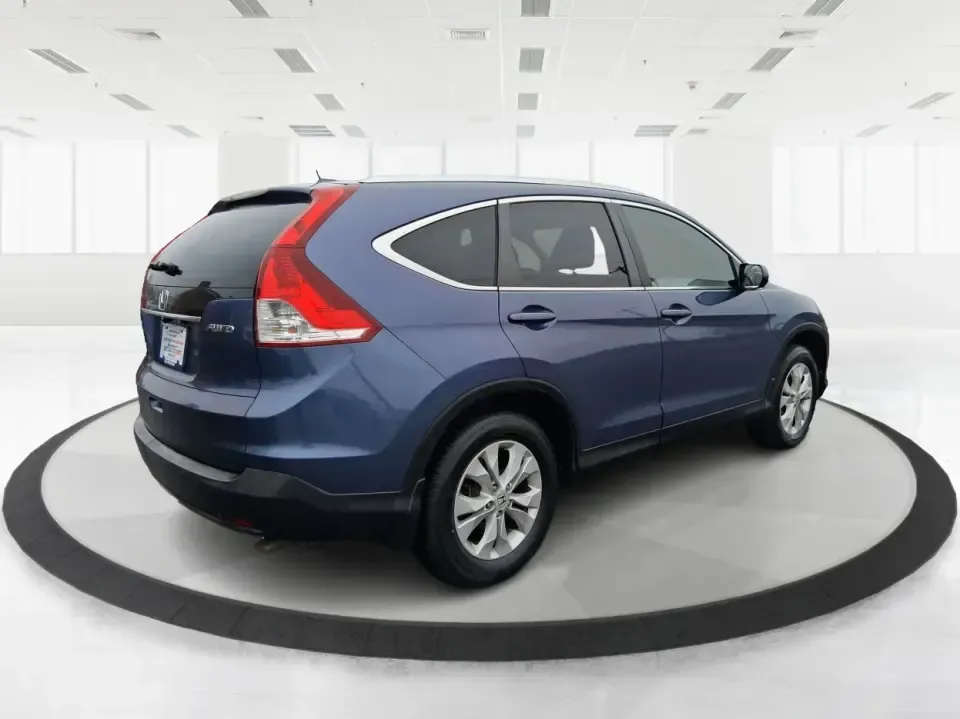2013 Honda CR-V EX-L (2HKRM4H74DH) with an 2.4L I-4 DOHC engine, 5-Speed Automatic transmission, located at 1184 Kauffman Ave, Fairborn, OH, 45324, (937) 908-9800, 39.807072, -84.030914 - Picture your next weekend: a quick run up I75 for a Dayton Dragons game, a family trip to Treasure Island Park, or a snowy school-morning commute across Troy-without stressing about space, comfort, or traction. This 2013 Honda CRV EXL in Twilight Blue Metallic is the kind of do-it-all SUV that fits - Photo#23