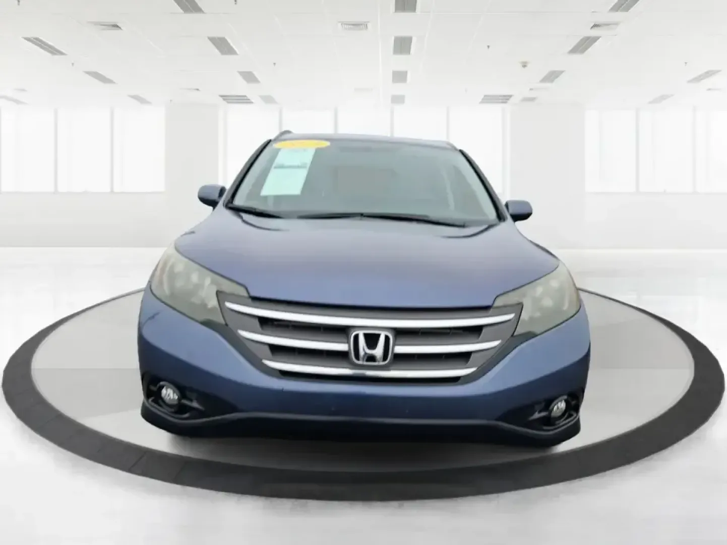 2013 Honda CR-V EX-L 4WD 5-Speed AT (2HKRM4H74DH) with an 2.4L L4 DOHC 16V engine, 5-Speed Automatic transmission, located at 1184 Kauffman Ave, Fairborn, OH, 45324, (937) 908-9800, 39.807072, -84.030914 - Picture your next Ohio weekend: loading up for a short road trip to Yellow Springs, meeting friends near Wright-Patterson Air Force Base, or tackling a snowy commute on I-675 with confidence. This 2013 Honda CR-V EX-L in Twilight Blue Metallic is the kind of practical, comfortable SUV that fits real- Photo#7