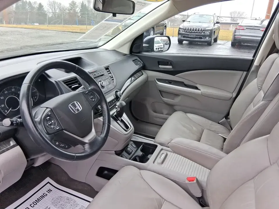 2013 Honda CR-V EX-L (2HKRM4H74DH) with an 2.4L I-4 DOHC engine, 5-Speed Automatic transmission, located at 1184 Kauffman Ave, Fairborn, OH, 45324, (937) 908-9800, 39.807072, -84.030914 - Picture your next weekend: a quick run up I75 for a Dayton Dragons game, a family trip to Treasure Island Park, or a snowy school-morning commute across Troy-without stressing about space, comfort, or traction. This 2013 Honda CRV EXL in Twilight Blue Metallic is the kind of do-it-all SUV that fits - Photo#30