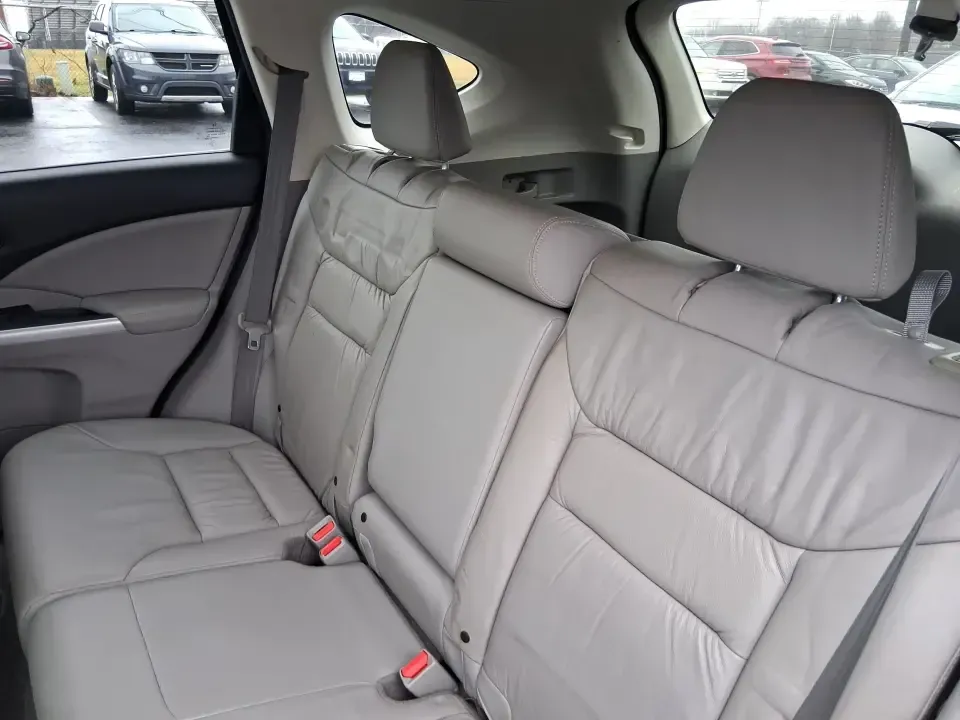 2013 Honda CR-V EX-L (2HKRM4H74DH) with an 2.4L I-4 DOHC engine, 5-Speed Automatic transmission, located at 1184 Kauffman Ave, Fairborn, OH, 45324, (937) 908-9800, 39.807072, -84.030914 - Picture your next weekend: a quick run up I75 for a Dayton Dragons game, a family trip to Treasure Island Park, or a snowy school-morning commute across Troy-without stressing about space, comfort, or traction. This 2013 Honda CRV EXL in Twilight Blue Metallic is the kind of do-it-all SUV that fits - Photo#31