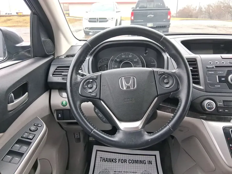 2013 Honda CR-V EX-L (2HKRM4H74DH) with an 2.4L I-4 DOHC engine, 5-Speed Automatic transmission, located at 1184 Kauffman Ave, Fairborn, OH, 45324, (937) 908-9800, 39.807072, -84.030914 - Picture your next weekend: a quick run up I75 for a Dayton Dragons game, a family trip to Treasure Island Park, or a snowy school-morning commute across Troy-without stressing about space, comfort, or traction. This 2013 Honda CRV EXL in Twilight Blue Metallic is the kind of do-it-all SUV that fits - Photo#37