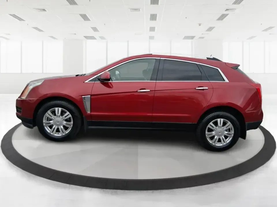 2013 Cadillac SRX Luxury Collection (3GYFNGE3XDS) with an 3.6L V-6 gasoline direct injection engine, 6-Speed Automatic transmission, located at 1230 East Main St, Xenia, OH, 45385, (937) 908-9800, 39.688026, -83.910172 - Make every day feel a little more first-class-whether you're commuting from Xenia to Beavercreek, planning a family run to the Greene County Fairgrounds, or loading up for a weekend getaway through Clifton Gorge. This 2013 Cadillac SRX Luxury Collection is the kind of SUV that fits real life: comfor - Photo#4