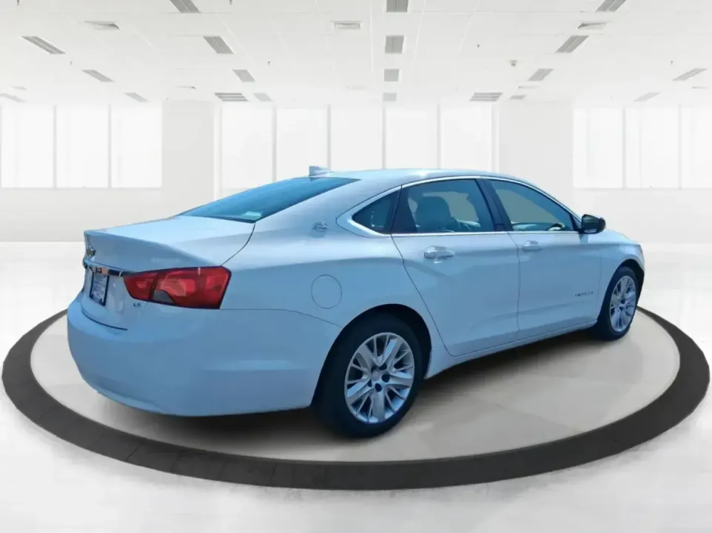 2016 Chevrolet Impala 1FL (2G11X5SA3G9) with an Ecotec 2.5L I-4 gasoline direct injection engine, 6A transmission, located at 401 Woodman Dr, Riverside, OH, 45431, (937) 908-9800, 39.760899, -84.123421 - Need a comfortable, dependable sedan for daily commutes, school drop-offs, and weekend getaways without the stress of traditional bank hoops? This 2016 Chevrolet Impala 1FL in Summit White is built for real life in the Dayton-area-smooth on I-675 and Route 35, easy to park around The Greene, and rel - Photo#2