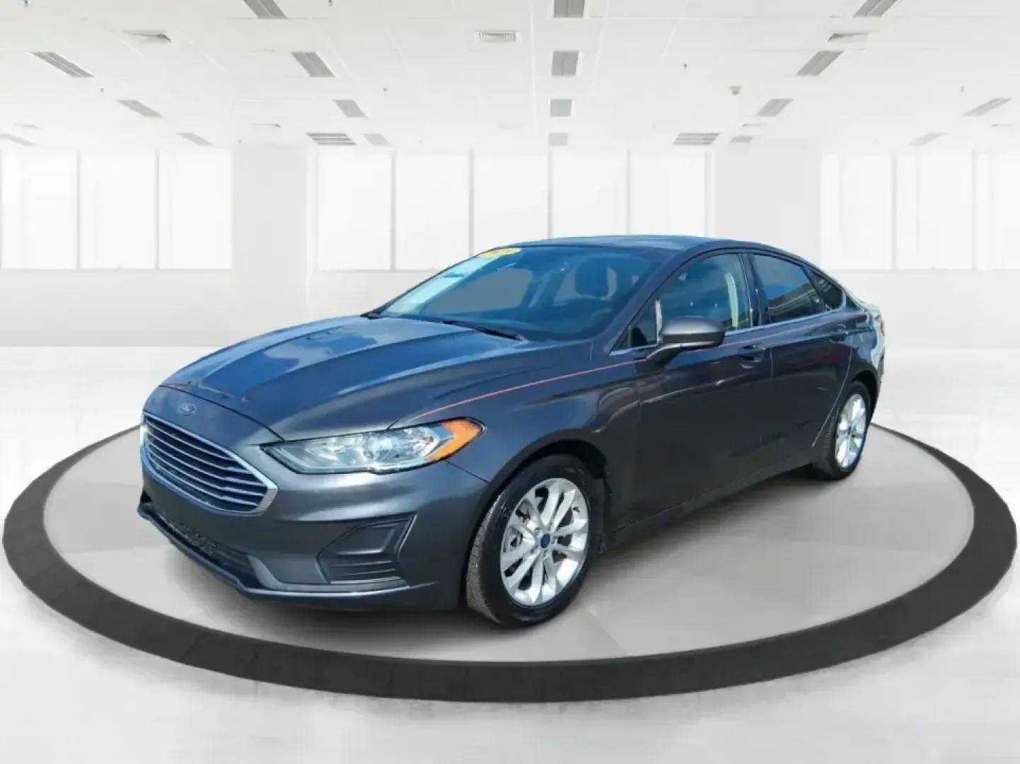 2019 Ford Fusion SE (3FA6P0H74KR) with an 2.5L L4 DOHC 16V engine, 6A transmission, located at 4508 South Dixie Dr, Moraine, OH, 45439, (937) 908-9800, 39.689976, -84.218452 - Need a reliable commuter sedan that can handle the daily grind from Riverside to Downtown Dayton, plus weekend runs to The Greene or a quick getaway to Carillon Historical Park? This 2019 Ford Fusion SE is built for real life-comfortable for long commutes, efficient on regular unleaded, and packed w - Photo#8