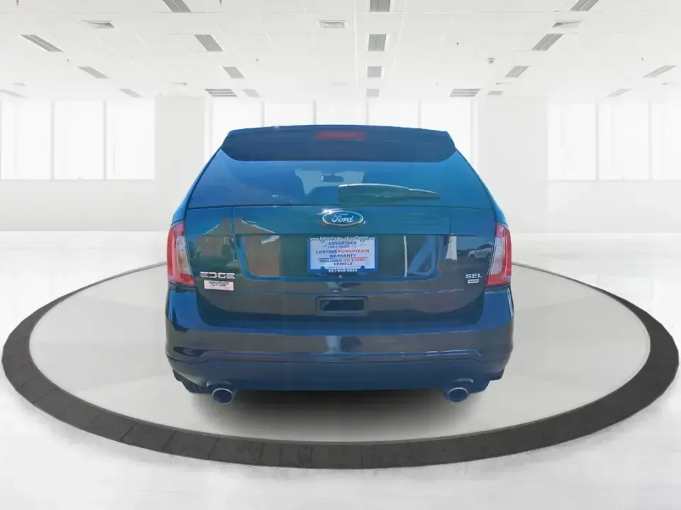 2014 Ford Edge SEL (2FMDK4JC8EB) with an 3.5L V-6 DOHC engine, 6-Speed Automatic transmission, located at 1184 Kauffman Ave, Fairborn, OH, 45324, (937) 908-9800, 39.807072, -84.030914 - Pack up the kids, load the groceries, or point the nose toward a weekend getaway-this 2014 Ford Edge SEL is the kind of SUV that fits real life in Fairborn. With confident all-weather capability and a comfortable, feature-rich cabin, it's ideal for commuters running I-675, families shuttling between - Photo#2