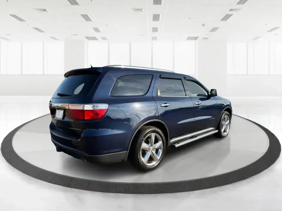 2013 Dodge Durango Citadel (1C4SDJET6DC) with an 5.7L V8 OHV 16V engine, 5-Speed Automatic transmission, located at 1951 S Dayton Lakeview Rd., New Carlisle, OH, 45344, (937) 908-9800, 39.890999, -84.050255 - Need one SUV that can handle school drop-offs, I-75 commutes, and a loaded-up weekend trip to Indian Lake or a tailgate in Dayton-without giving up comfort or capability? This 2013 Dodge Durango Citadel in True Blue Pearlcoat is built for real-life Ohio driving, with confident 4WD/AWD traction, V8 p - Photo#2