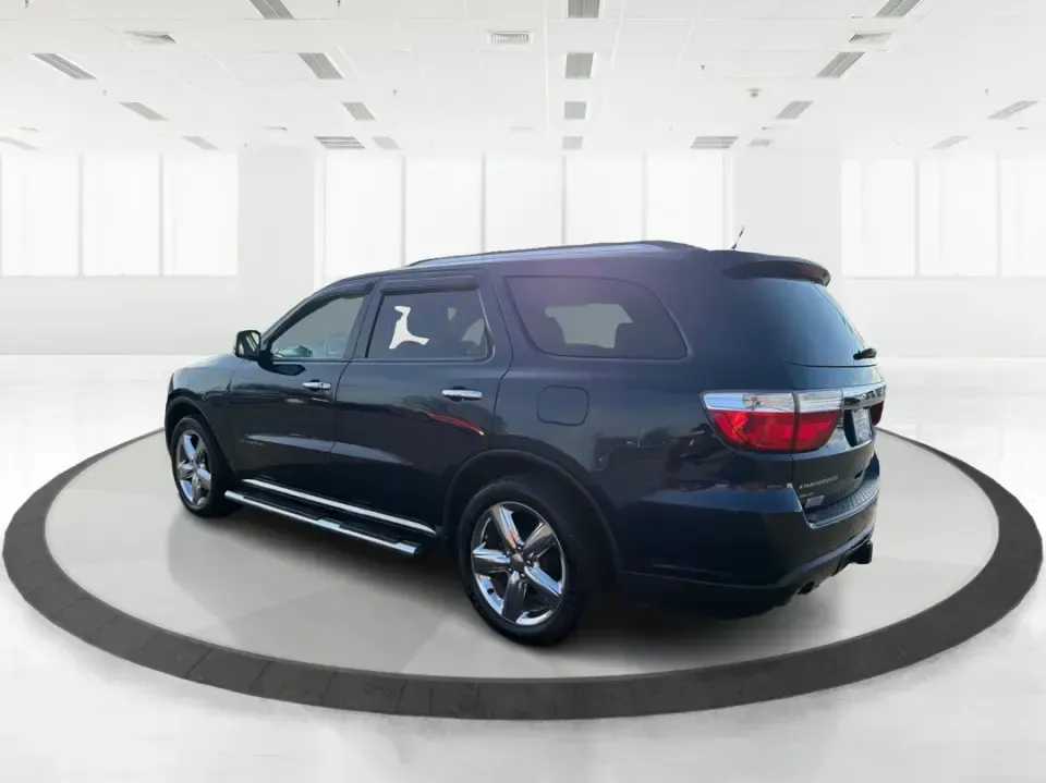 2013 Dodge Durango Citadel (1C4SDJET6DC) with an 5.7L V8 OHV 16V engine, 5-Speed Automatic transmission, located at 1951 S Dayton Lakeview Rd., New Carlisle, OH, 45344, (937) 908-9800, 39.890999, -84.050255 - Need one SUV that can handle school drop-offs, I-75 commutes, and a loaded-up weekend trip to Indian Lake or a tailgate in Dayton-without giving up comfort or capability? This 2013 Dodge Durango Citadel in True Blue Pearlcoat is built for real-life Ohio driving, with confident 4WD/AWD traction, V8 p - Photo#4