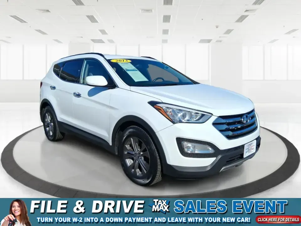 2013 Hyundai Santa Fe Sport (5XYZU3LB7DG) with an Theta II 2.4L I-4 gasoline direct injection engine, 6-Speed Automatic transmission, located at 880 E. National Road, Vandalia, OH, 45377, (937) 908-9800, 39.891918, -84.183594 - Need one SUV that can handle school drop-offs, I75 commutes, and a weekend escape to Taylorsville MetroPark without draining your budget? This 2013 Hyundai Santa Fe Sport is a smart, road-trip-ready crossover that blends everyday practicality with comfort features you'll appreciate on longer drives - Photo#0