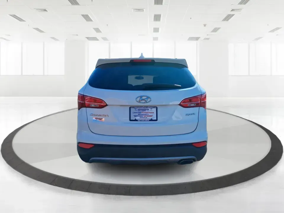 2013 Hyundai Santa Fe Sport (5XYZU3LB7DG) with an Theta II 2.4L I-4 gasoline direct injection engine, 6-Speed Automatic transmission, located at 880 E. National Road, Vandalia, OH, 45377, (937) 908-9800, 39.891918, -84.183594 - Need one SUV that can handle school drop-offs, I75 commutes, and a weekend escape to Taylorsville MetroPark without draining your budget? This 2013 Hyundai Santa Fe Sport is a smart, road-trip-ready crossover that blends everyday practicality with comfort features you'll appreciate on longer drives - Photo#3