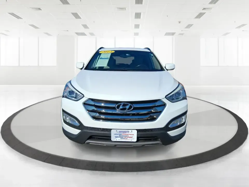 2013 Hyundai Santa Fe Sport (5XYZU3LB7DG) with an Theta II 2.4L I-4 gasoline direct injection engine, 6-Speed Automatic transmission, located at 880 E. National Road, Vandalia, OH, 45377, (937) 908-9800, 39.891918, -84.183594 - Need one SUV that can handle school drop-offs, I75 commutes, and a weekend escape to Taylorsville MetroPark without draining your budget? This 2013 Hyundai Santa Fe Sport is a smart, road-trip-ready crossover that blends everyday practicality with comfort features you'll appreciate on longer drives - Photo#7