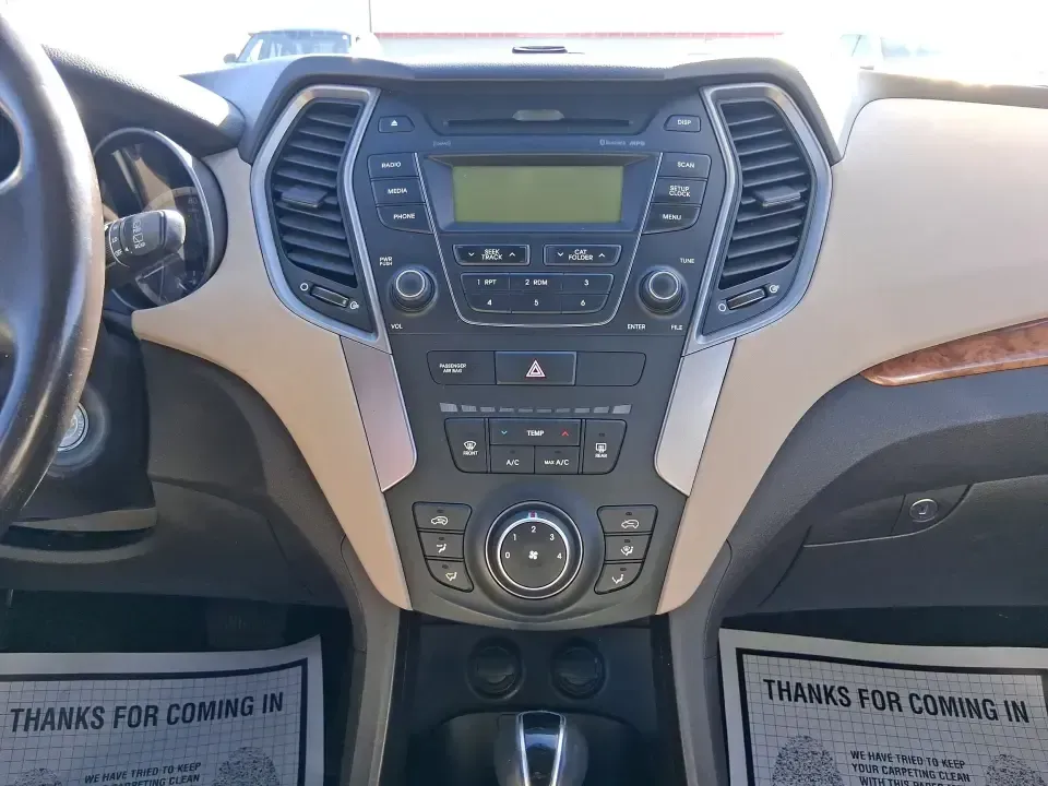 2013 Hyundai Santa Fe Sport (5XYZU3LB7DG) with an Theta II 2.4L I-4 gasoline direct injection engine, 6-Speed Automatic transmission, located at 880 E. National Road, Vandalia, OH, 45377, (937) 908-9800, 39.891918, -84.183594 - Need one SUV that can handle school drop-offs, I75 commutes, and a weekend escape to Taylorsville MetroPark without draining your budget? This 2013 Hyundai Santa Fe Sport is a smart, road-trip-ready crossover that blends everyday practicality with comfort features you'll appreciate on longer drives - Photo#13