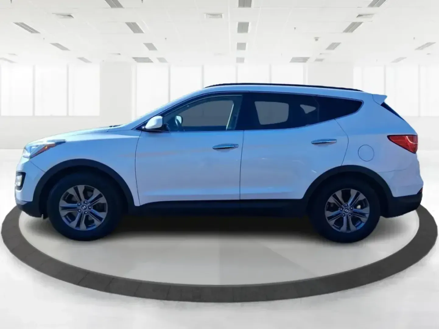 2013 Hyundai Santa Fe Sport (5XYZU3LB7DG) with an Theta II 2.4L I-4 gasoline direct injection engine, 6-Speed Automatic transmission, located at 1951 S Dayton Lakeview Rd., New Carlisle, OH, 45344, (937) 908-9800, 39.890999, -84.050255 - Need one SUV that can handle school drop-offs, I75 commutes, and a weekend escape to Taylorsville MetroPark without draining your budget? This 2013 Hyundai Santa Fe Sport is a smart, road-trip-ready crossover that blends everyday practicality with comfort features you'll appreciate on longer drives - Photo#5