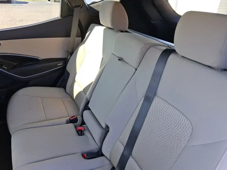 2013 Hyundai Santa Fe Sport (5XYZU3LB7DG) with an Theta II 2.4L I-4 gasoline direct injection engine, 6-Speed Automatic transmission, located at 1951 S Dayton Lakeview Rd., New Carlisle, OH, 45344, (937) 908-9800, 39.890999, -84.050255 - Need one SUV that can handle school drop-offs, I75 commutes, and a weekend escape to Taylorsville MetroPark without draining your budget? This 2013 Hyundai Santa Fe Sport is a smart, road-trip-ready crossover that blends everyday practicality with comfort features you'll appreciate on longer drives - Photo#10
